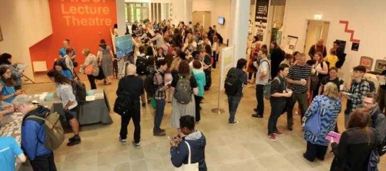 An image of conference attendees in Kings Building